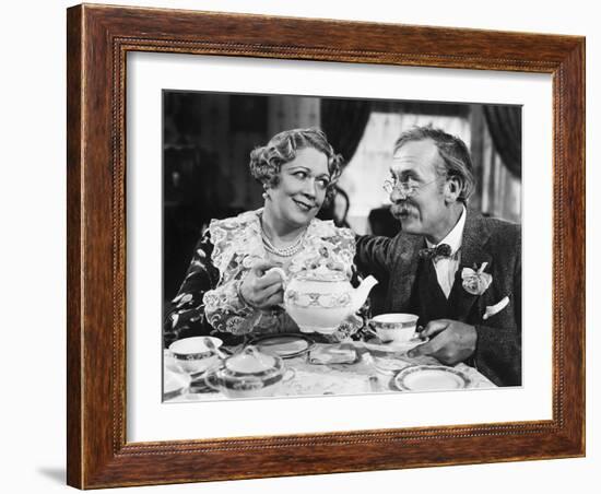 Couple Sitting Together Having Tea-null-Framed Photo