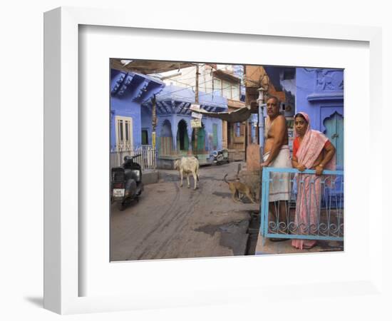 Couple Standing Outside Blue Painted Residential Haveli, Old City, Jodhpur, Rajasthan State, India-Eitan Simanor-Framed Photographic Print