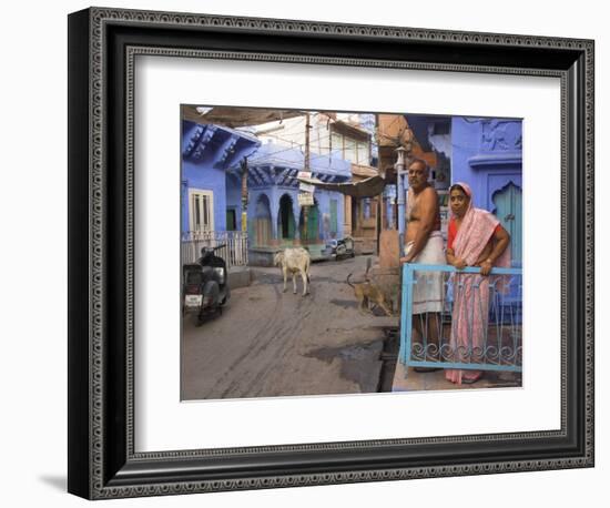 Couple Standing Outside Blue Painted Residential Haveli, Old City, Jodhpur, Rajasthan State, India-Eitan Simanor-Framed Photographic Print