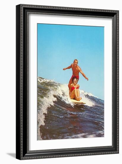 Couple Surfing-null-Framed Art Print