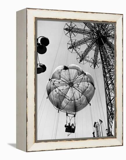 Couple Taking a Ride on the 300 Ft. Parachute Jump at Coney Island Amusement Park-Marie Hansen-Framed Premier Image Canvas