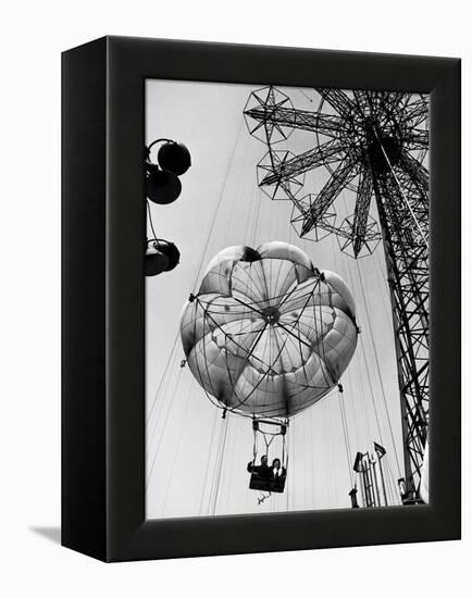 Couple Taking a Ride on the 300 Ft. Parachute Jump at Coney Island Amusement Park-Marie Hansen-Framed Premier Image Canvas