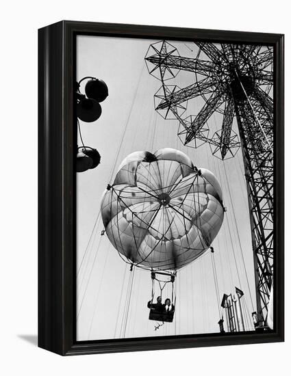 Couple Taking a Ride on the 300 Ft. Parachute Jump at Coney Island Amusement Park-Marie Hansen-Framed Premier Image Canvas