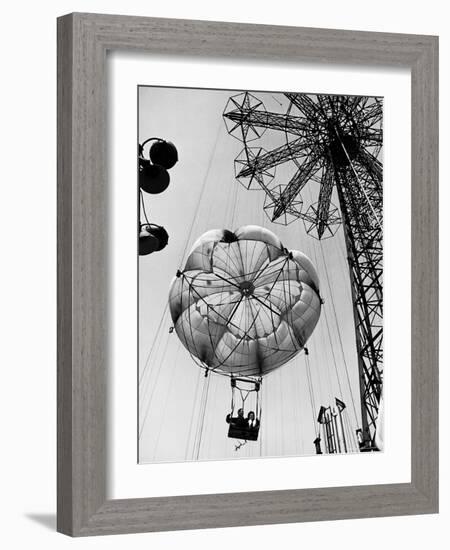 Couple Taking a Ride on the 300 Ft. Parachute Jump at Coney Island Amusement Park-Marie Hansen-Framed Photographic Print