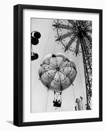 Couple Taking a Ride on the 300 Ft. Parachute Jump at Coney Island Amusement Park-Marie Hansen-Framed Photographic Print