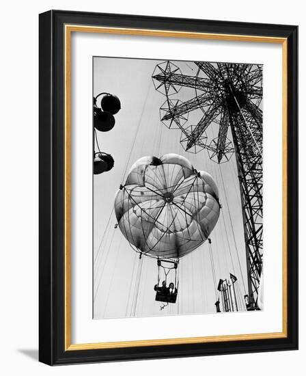 Couple Taking a Ride on the 300 Ft. Parachute Jump at Coney Island Amusement Park-Marie Hansen-Framed Photographic Print