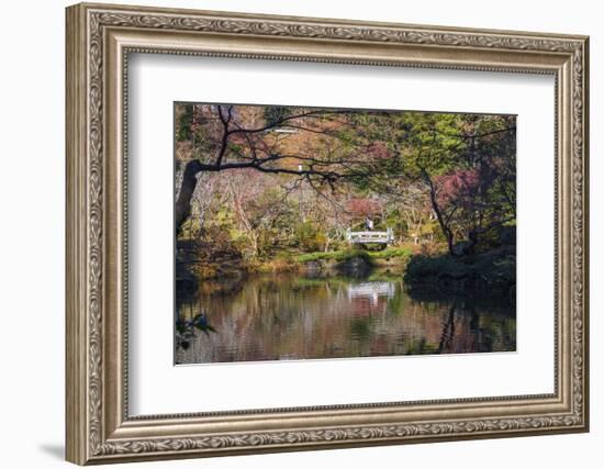 Couple walking across a bridge over a pond in the Narita Temple Garden-Sheila Haddad-Framed Photographic Print