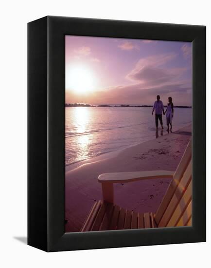Couple Walking Along Beach at Sunset, Nassau, Bahamas, Caribbean-Greg Johnston-Framed Premier Image Canvas