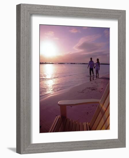 Couple Walking Along Beach at Sunset, Nassau, Bahamas, Caribbean-Greg Johnston-Framed Photographic Print