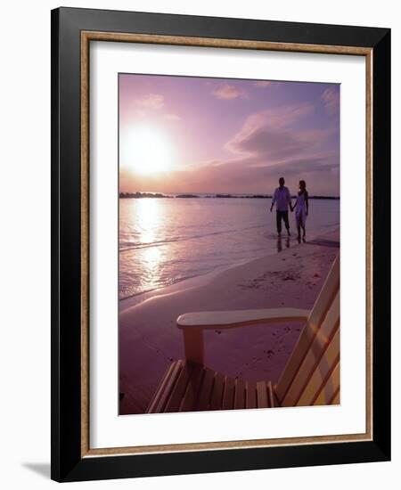 Couple Walking Along Beach at Sunset, Nassau, Bahamas, Caribbean-Greg Johnston-Framed Photographic Print