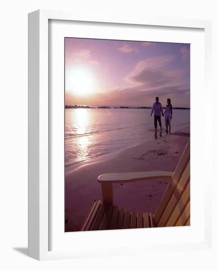 Couple Walking Along Beach at Sunset, Nassau, Bahamas, Caribbean-Greg Johnston-Framed Photographic Print