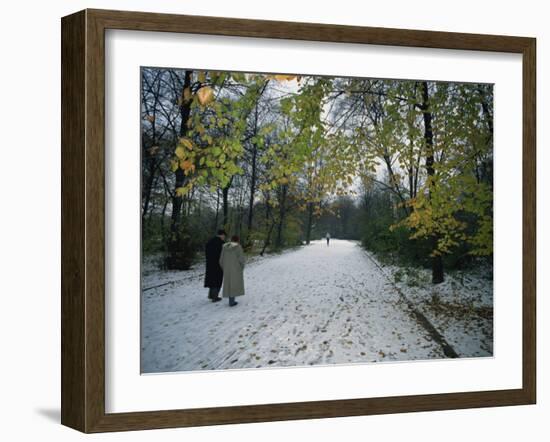 Couple Walking in the Snow in the Tiergarten, Berlin, Germany, Europe-Robert Francis-Framed Photographic Print