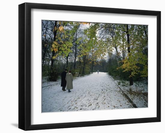 Couple Walking in the Snow in the Tiergarten, Berlin, Germany, Europe-Robert Francis-Framed Photographic Print