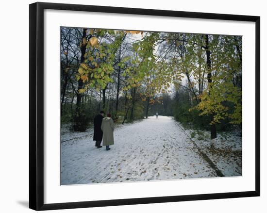 Couple Walking in the Snow in the Tiergarten, Berlin, Germany, Europe-Robert Francis-Framed Photographic Print