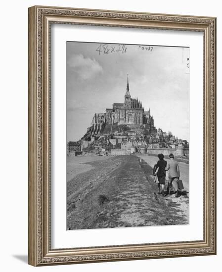 Couple Walking on Causeway Toward Mont Saint Michel-Ralph Morse-Framed Photographic Print