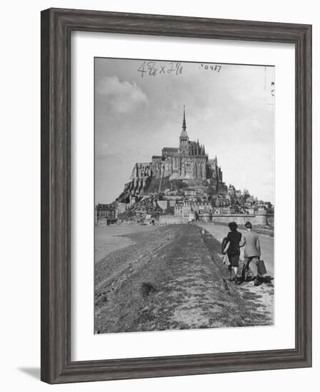 Couple Walking on Causeway Toward Mont Saint Michel-Ralph Morse-Framed Photographic Print