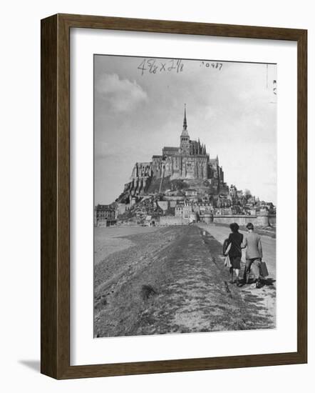 Couple Walking on Causeway Toward Mont Saint Michel-Ralph Morse-Framed Photographic Print