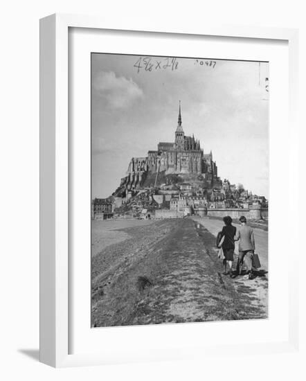 Couple Walking on Causeway Toward Mont Saint Michel-Ralph Morse-Framed Photographic Print