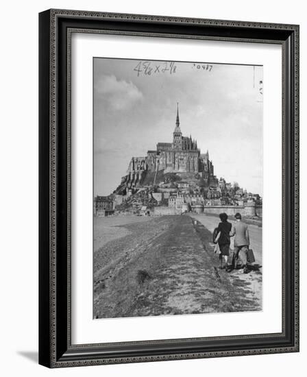 Couple Walking on Causeway Toward Mont Saint Michel-Ralph Morse-Framed Photographic Print