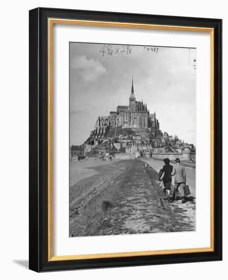 Couple Walking on Causeway Toward Mont Saint Michel-Ralph Morse-Framed Photographic Print