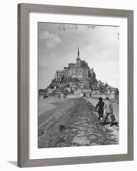 Couple Walking on Causeway Toward Mont Saint Michel-Ralph Morse-Framed Photographic Print