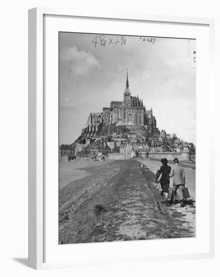 Couple Walking on Causeway Toward Mont Saint Michel-Ralph Morse-Framed Photographic Print