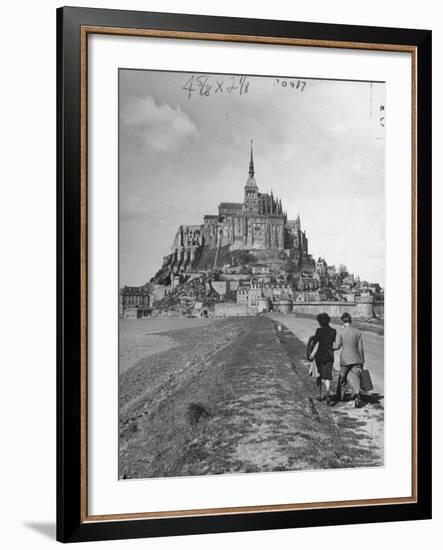Couple Walking on Causeway Toward Mont Saint Michel-Ralph Morse-Framed Photographic Print