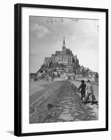 Couple Walking on Causeway Toward Mont Saint Michel-Ralph Morse-Framed Photographic Print