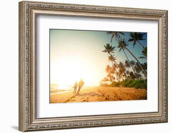 Couple Walking on the Sandy Beach with Palm Trees-Dudarev Mikhail-Framed Photographic Print