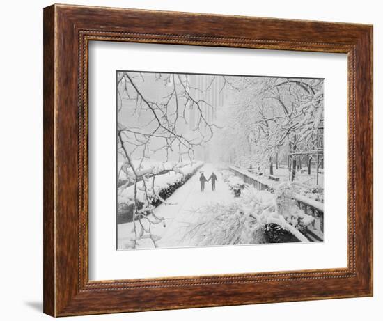 Couple Walking Through Park in Snow-Bettmann-Framed Photographic Print