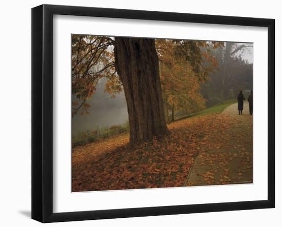 Couple Walking Through the Jephson Gardens in Autumn, Leamington Spa, Warwickshire, England-David Hughes-Framed Photographic Print