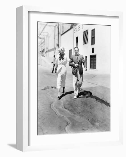 Couple Walking Together and Laughing-null-Framed Photo