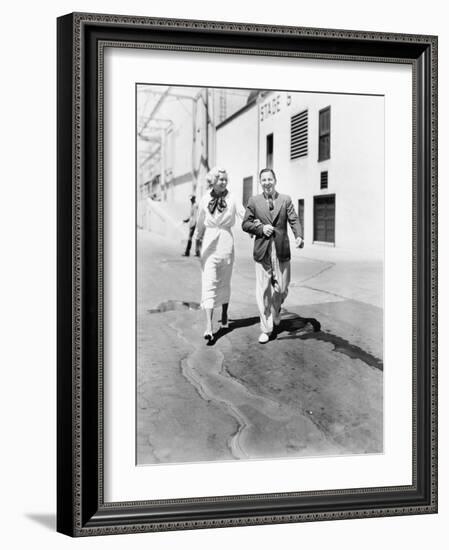 Couple Walking Together and Laughing-null-Framed Photo