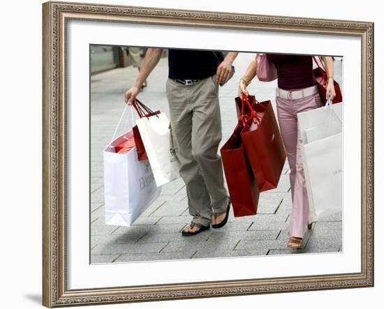 Couple Walking with Shopping Bags on Konigsallee, Dusseldorf, North Rhine Westphalia, Germany-Yadid Levy-Framed Photographic Print