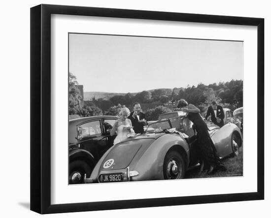 Couples Enjoying Food During Intermission of the Opera at the Glyndebourne Festival-Cornell Capa-Framed Photographic Print