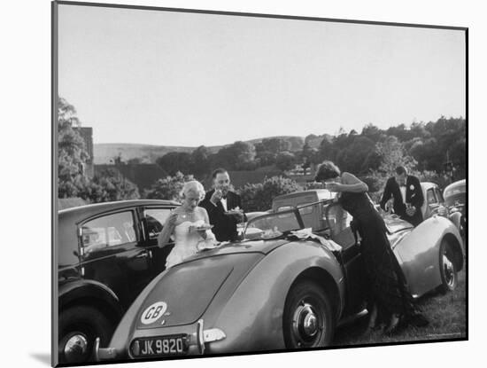 Couples Enjoying Food During Intermission of the Opera at the Glyndebourne Festival-Cornell Capa-Mounted Photographic Print