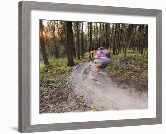 Courtney Feldt Mountain Bikes on Singletrack of the Whitefish Trail Near Whitefish, Montana, Usa-Chuck Haney-Framed Photographic Print