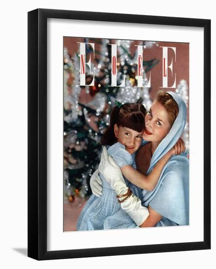 Cover of French Magazine Elle December, 1948: a Mother with Her Daughter in Front of Christmas Tree-null-Framed Photo