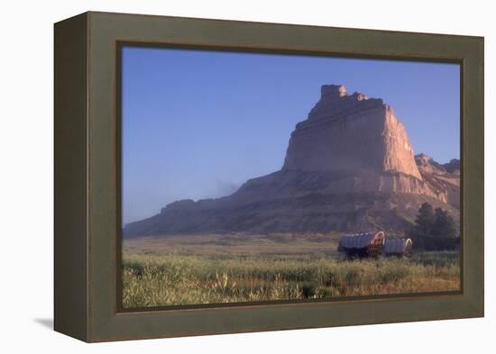 Covered Wagons on the Oregon Trail at Scotts Bluff, Nebraska, at Sunrise-null-Framed Premier Image Canvas