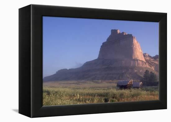 Covered Wagons on the Oregon Trail at Scotts Bluff, Nebraska, at Sunrise-null-Framed Premier Image Canvas