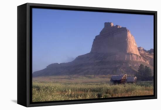 Covered Wagons on the Oregon Trail at Scotts Bluff, Nebraska, at Sunrise-null-Framed Premier Image Canvas