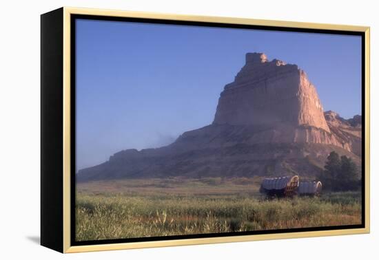 Covered Wagons on the Oregon Trail at Scotts Bluff, Nebraska, at Sunrise-null-Framed Premier Image Canvas