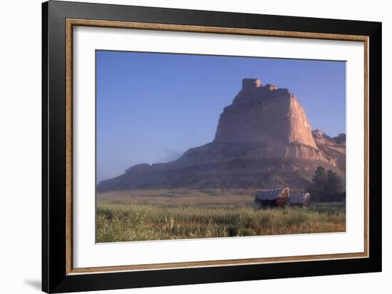 Covered Wagons on the Oregon Trail at Scotts Bluff, Nebraska, at Sunrise-null-Framed Photographic Print