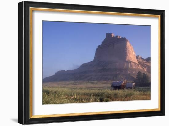 Covered Wagons on the Oregon Trail at Scotts Bluff, Nebraska, at Sunrise-null-Framed Photographic Print