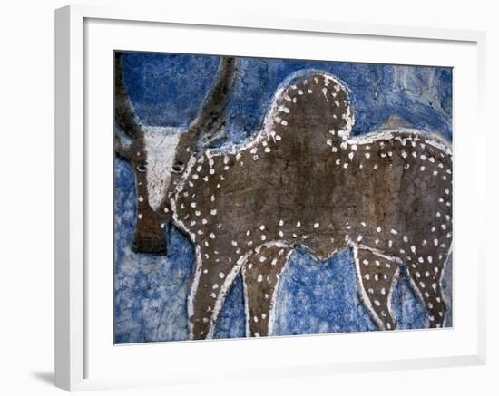 Cow on a Graveyard Headstone near an Oromo village, Ethiopia-Janis Miglavs-Framed Photographic Print