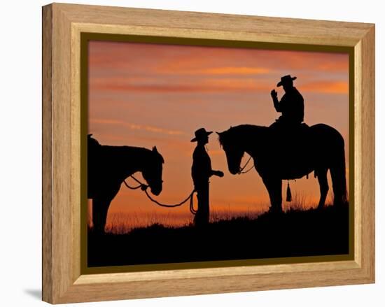 Cowboy and Cowgirl Silhouetted on a Ridge in the Big Horn Mountains, Wyoming, USA-Joe Restuccia III-Framed Premier Image Canvas