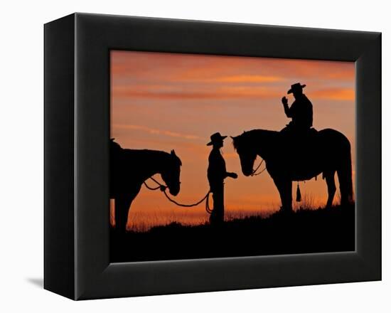 Cowboy and Cowgirl Silhouetted on a Ridge in the Big Horn Mountains, Wyoming, USA-Joe Restuccia III-Framed Premier Image Canvas