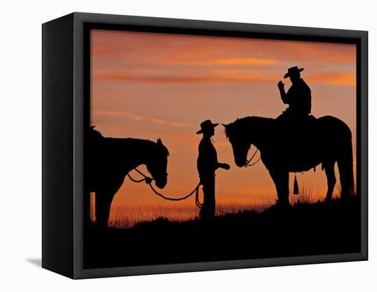 Cowboy and Cowgirl Silhouetted on a Ridge in the Big Horn Mountains, Wyoming, USA-Joe Restuccia III-Framed Premier Image Canvas