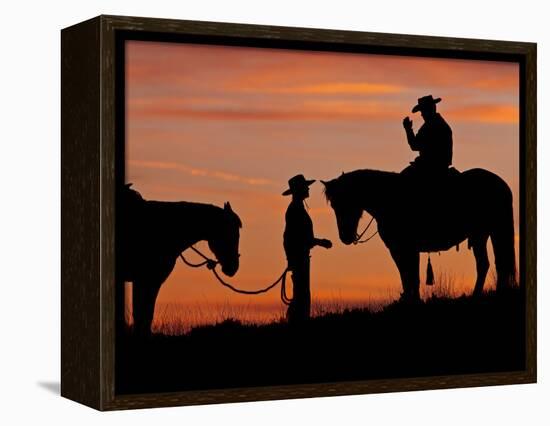 Cowboy and Cowgirl Silhouetted on a Ridge in the Big Horn Mountains, Wyoming, USA-Joe Restuccia III-Framed Premier Image Canvas