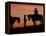 Cowboy and Cowgirl Silhouetted on a Ridge in the Big Horn Mountains, Wyoming, USA-Joe Restuccia III-Framed Premier Image Canvas